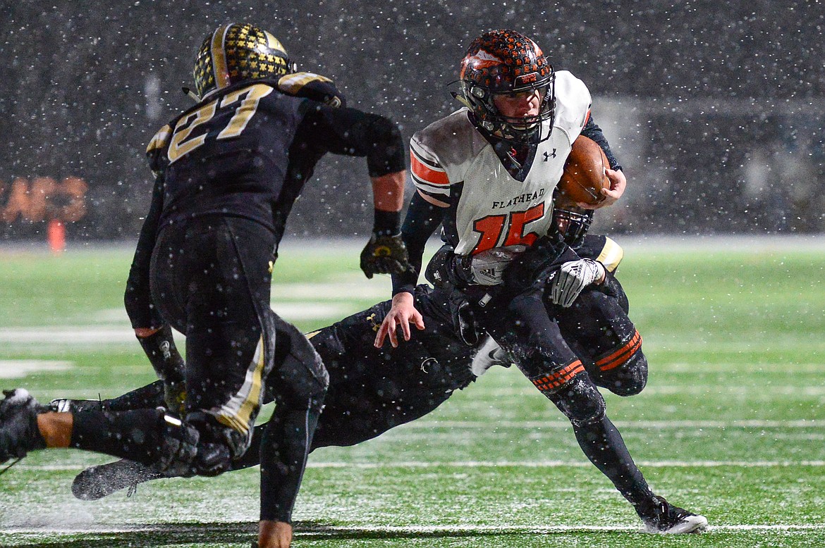 Flathead quarterback Jaden MacNeil (15) is stopped short of the end zone on a third down run in the fourth quarter on the Braves&#146; last drive against Billings West in the Class AA state championship at Wendy&#146;s Field at Daylis Stadium in Billings on Friday. (Casey Kreider/Daily Inter Lake)