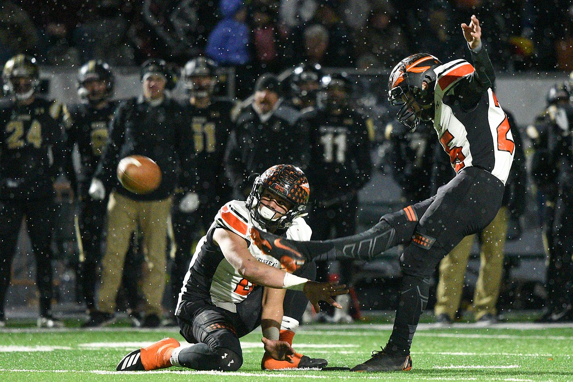 Flathead kicker Eric Gardner (25) attempts a field goal in the first half against Billings West in the Class AA state championship at Wendy&#146;s Field at Daylis Stadium in Billings on Friday. (Casey Kreider/Daily Inter Lake)