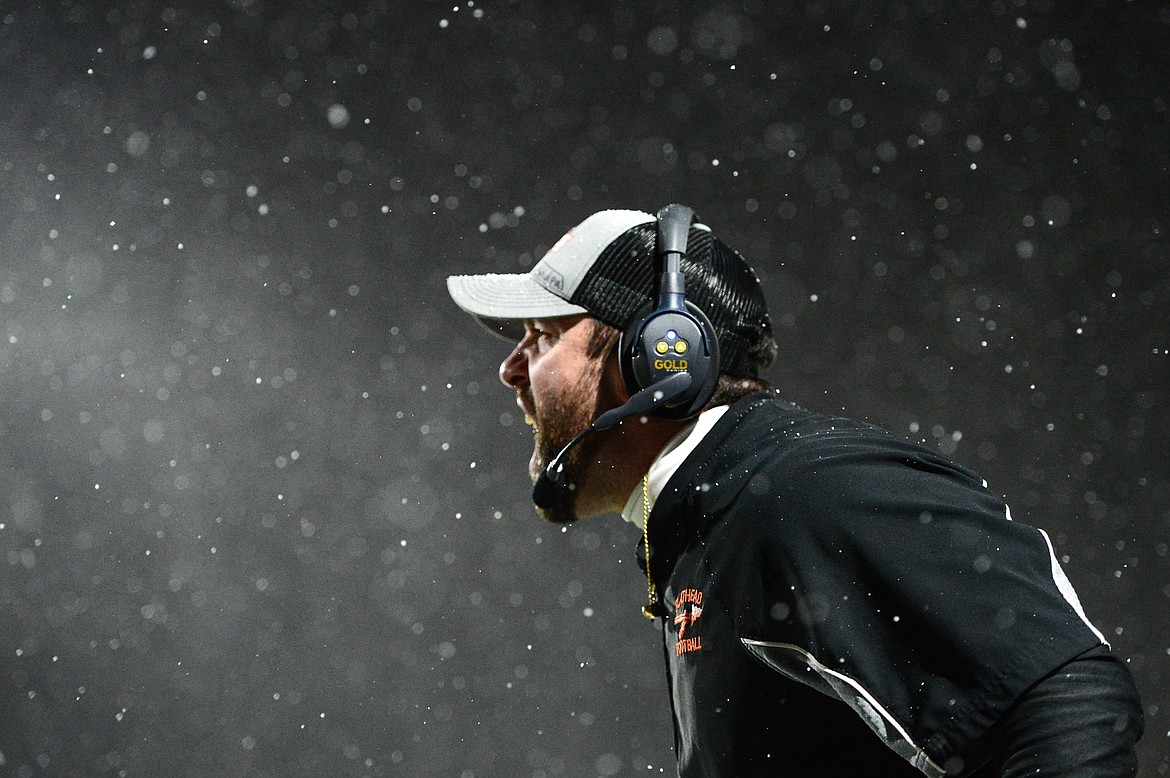 Flathead head coach Kyle Samson yells to his team from the sideline during the Class AA state championship against Billings West at Wendy&#146;s Field at Daylis Stadium in Billings on Friday. (Casey Kreider/Daily Inter Lake)