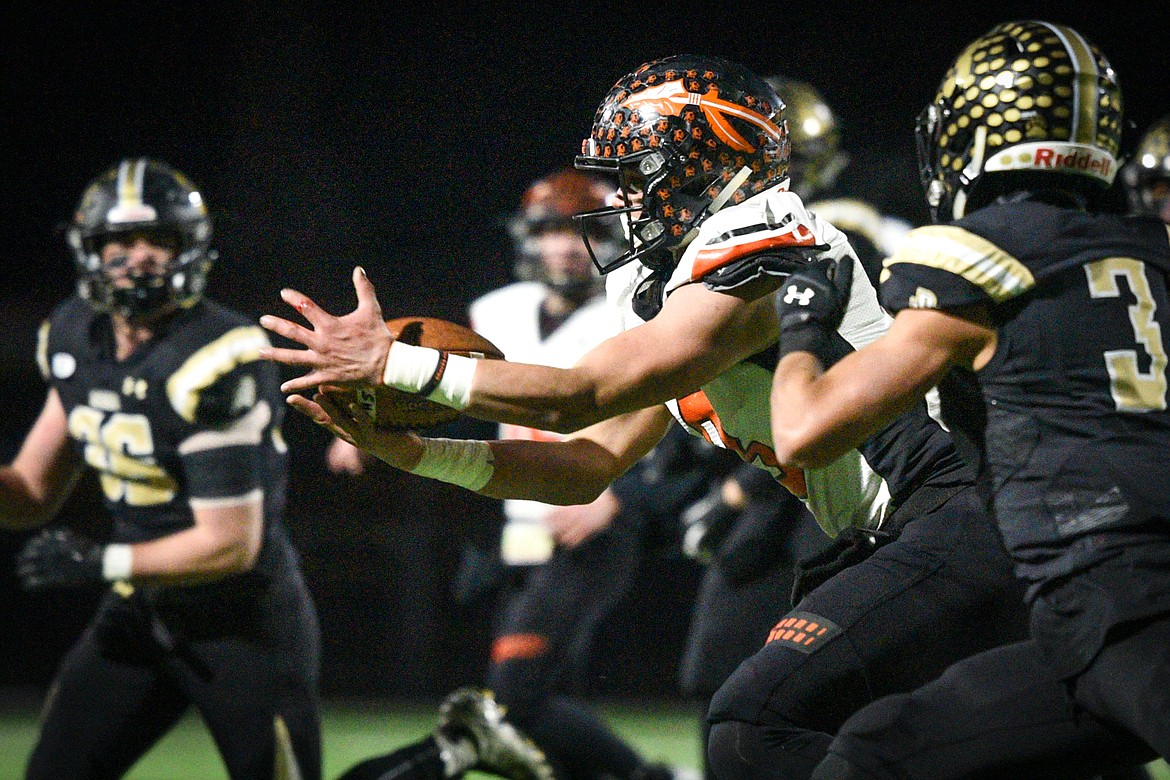 Flathead wide receiver Anthony Jones (8) catches a pass in the first half against Billings  West in the Class AA state championship at Wendy&#146;s Field at Daylis Stadium in Billings on Friday. (Casey Kreider/Daily Inter Lake)