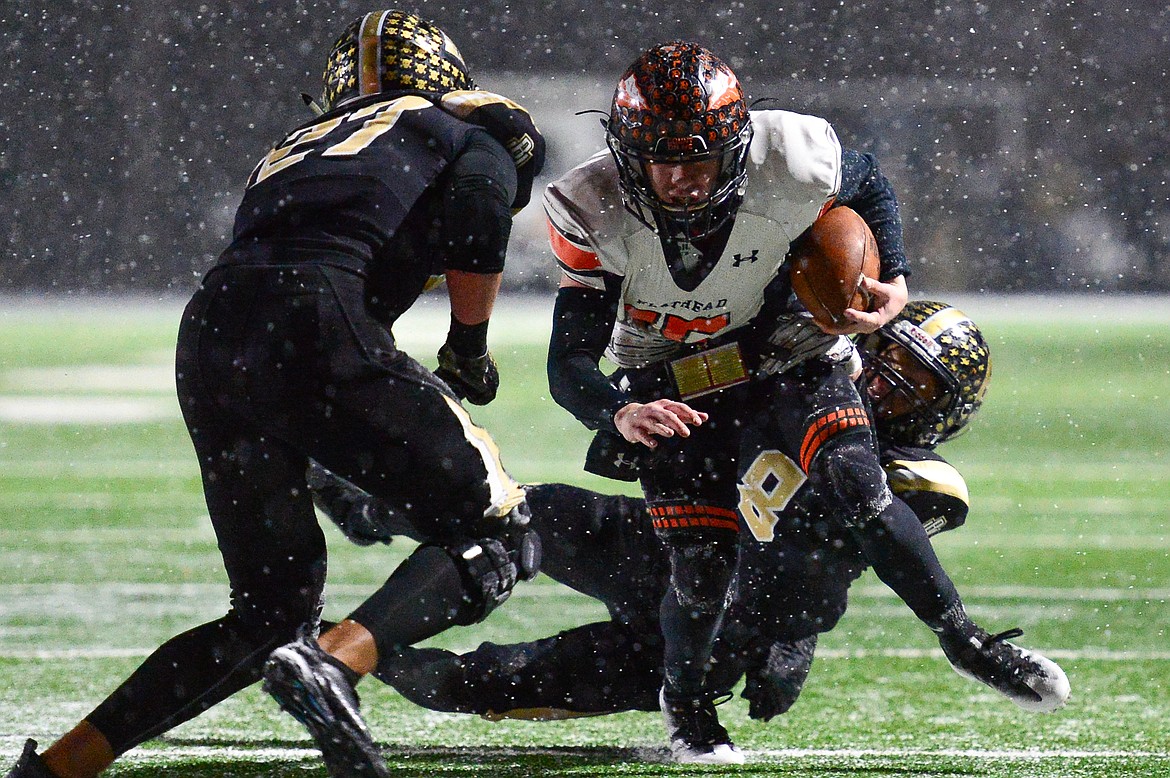 Flathead quarterback Jaden MacNeil (15) is stopped short of the end zone on third down run on the Braves last drive in the fourth quarter against Billings West in the Class AA state championship at Wendy&#146;s Field at Daylis Stadium in Billings on Friday. (Casey Kreider/Daily Inter Lake)