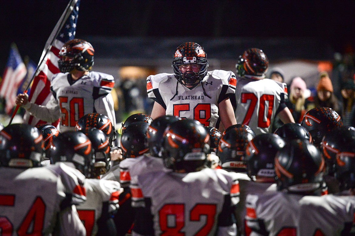 Flathead&#146;s Max Anderson (58) talks to his teammates before their matchup with Billings West in the Class AA state championship at Wendy&#146;s Field at Daylis Stadium in Billings on Friday. (Casey Kreider/Daily Inter Lake)