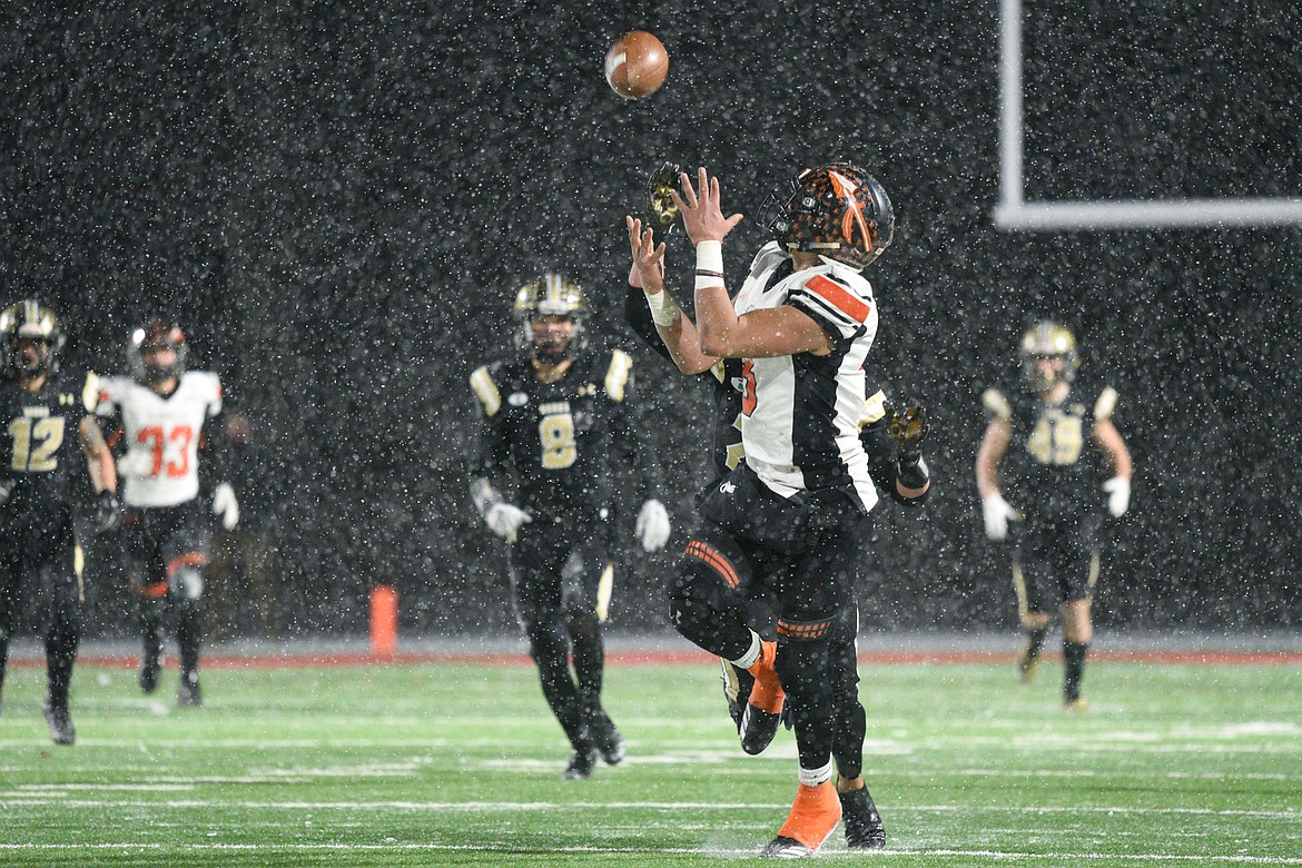 Flathead wide receiver Anthony Jones (8) hauls in a reception on the Braves&#146; last drive in the fourth quarter of a 20-14 loss to Billings West in the Class AA state championship at Wendy&#146;s Field at Daylis Stadium in Billings on Friday. (Casey Kreider/Daily Inter Lake)