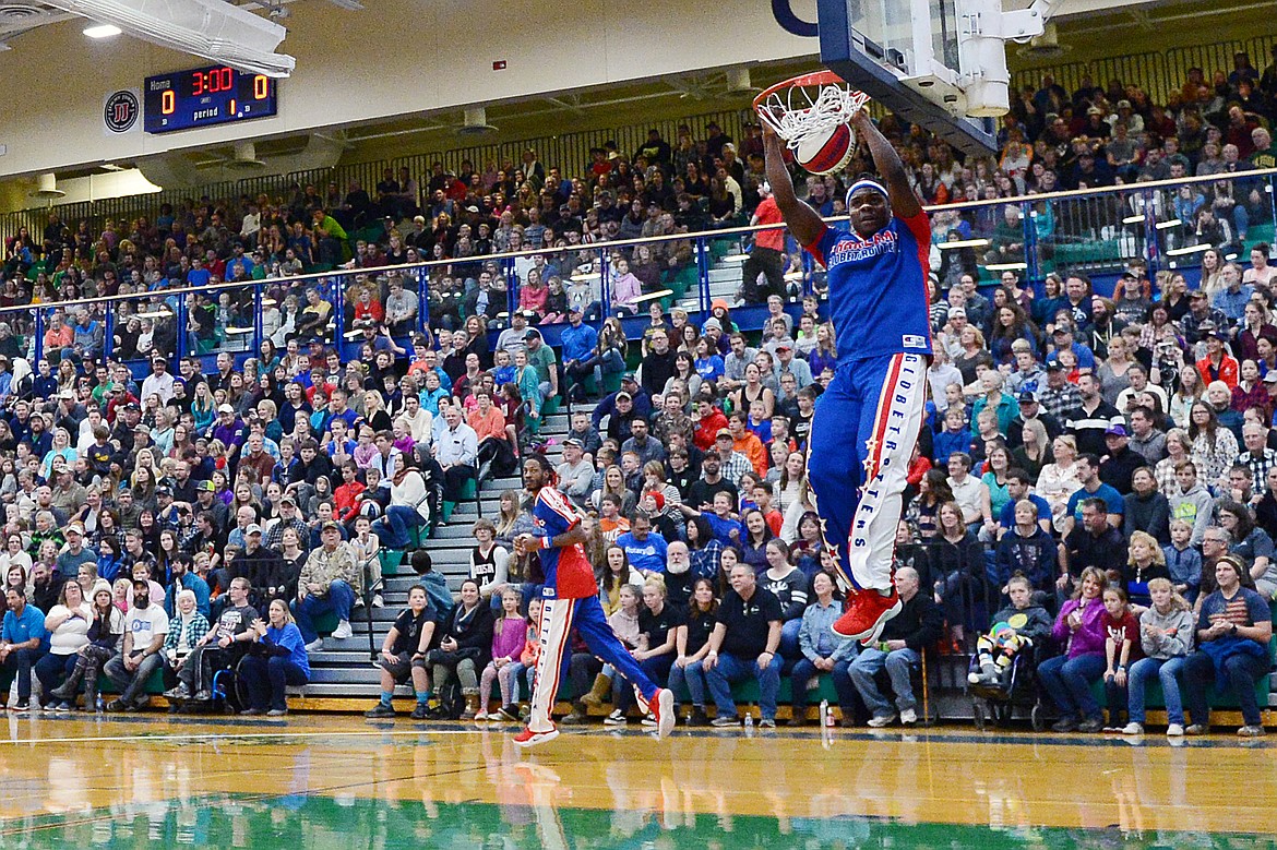 The Harlem Globetrotters warm up with a few dunks before their game against the Washington Generals at Glacier High School on Tuesday, Nov. 13. (Casey Kreider/Daily Inter Lake)