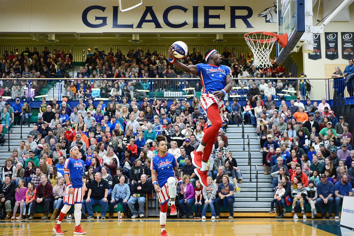 The Harlem Globetrotters warm up with a few dunks before their game against the Washington Generals at Glacier High School on Tuesday, Nov. 13. (Casey Kreider/Daily Inter Lake)