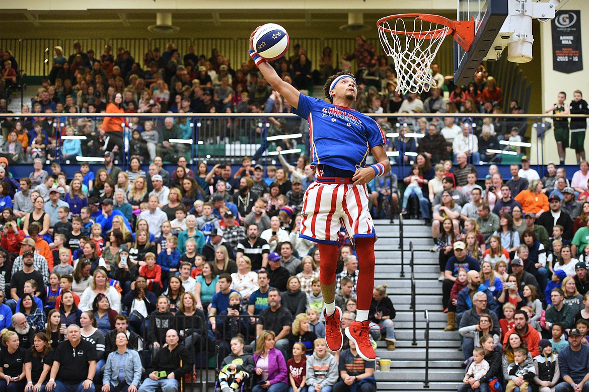 The Harlem Globetrotters warm up with a few dunks before their game against the Washington Generals at Glacier High School on Tuesday, Nov. 13. (Casey Kreider/Daily Inter Lake)