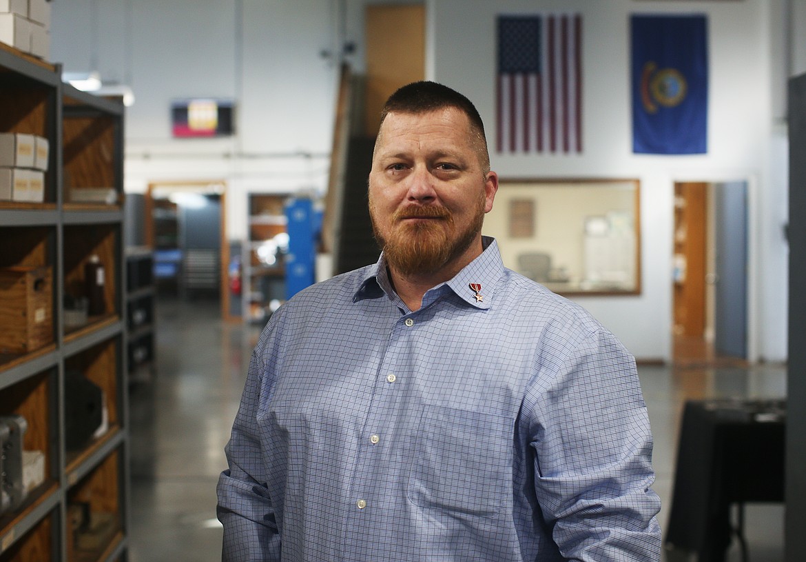 LOREN BENOIT/Press
Scot Frazer, vice president of sales and marketing for the Swiss Tech parts manufacturer in Post Falls, joined the Army in 1999. Frazer helps serve veterans as a mentor for the Spokane Veterans Forum and is a veterans representative on the Post Falls Chamber of Commerce board.