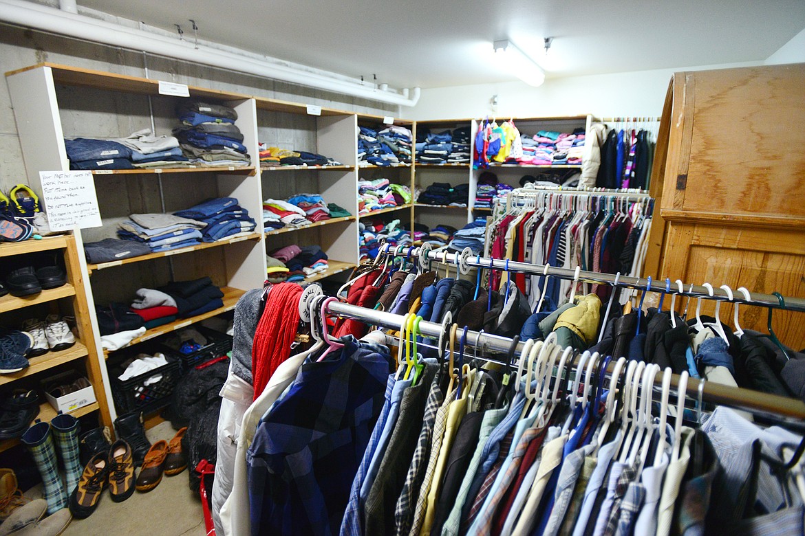 Basement storage areas house a wide array of personal items from clothing and shoes to spare beds and furniture that residents can use for free at Samaritan House in Kalispell.