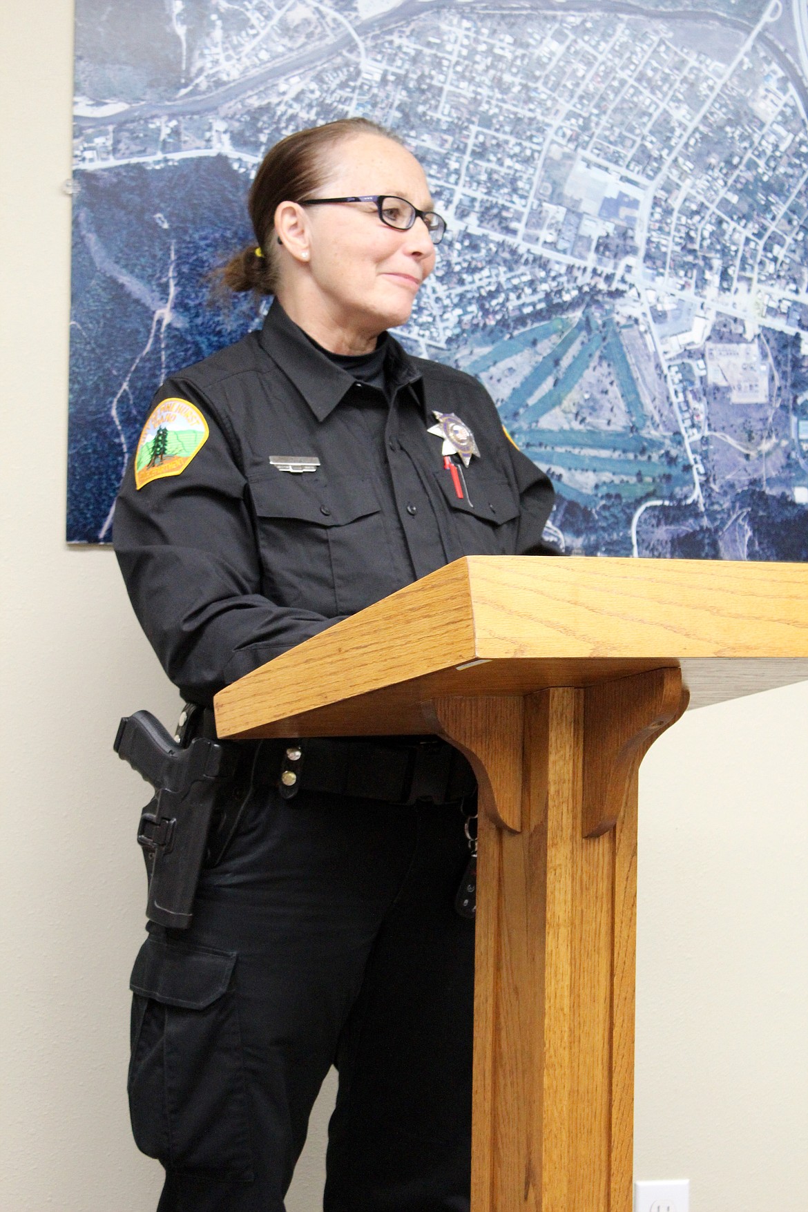 Chief Holdahl gives her first police report to the City Council.