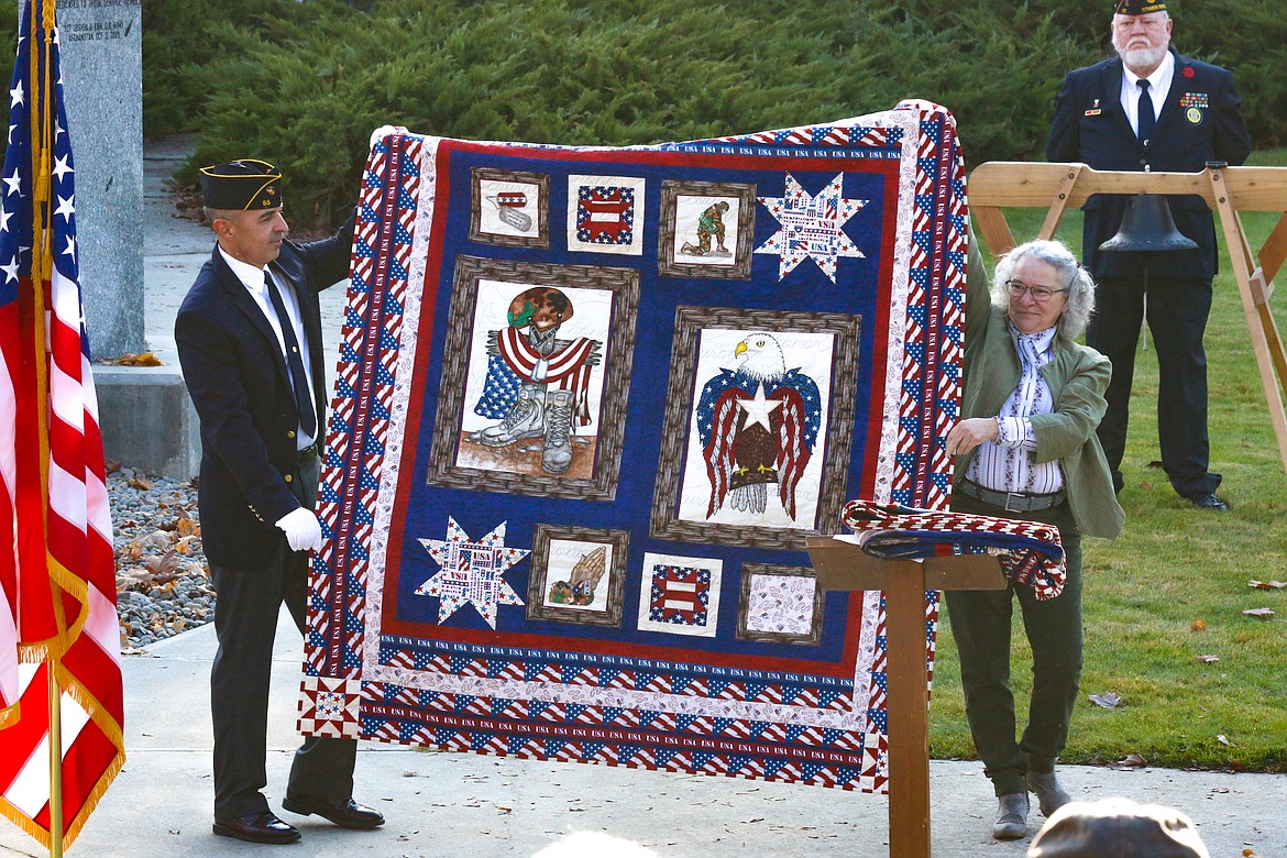 Photo by MANDI BATEMAN
Margaret Pyette reveals the latest quilts that she makes specially for two veterans every year.