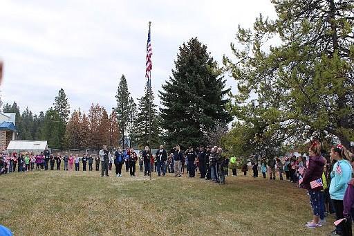 A &#147;Parade of Heroes&#148; leads the students to the flag ceremony.

Courtesy photo