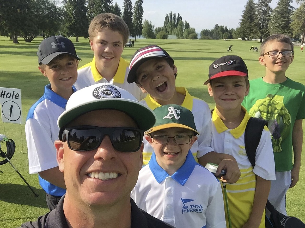 Cameron Milton makes a stop with some students at the Polson Bay Golf Course to snap a photo. (Photo courtesy Cameron Milton)