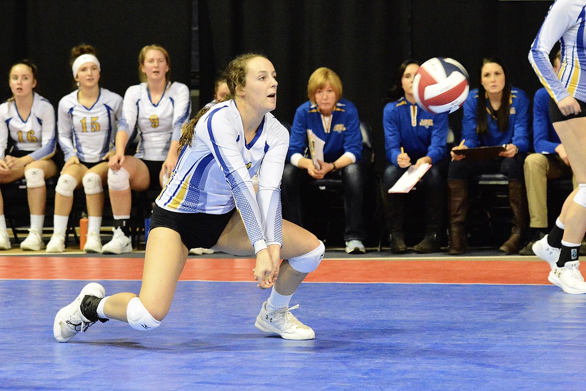 Libby senior Jayden Winslow goes down for a return during the state tournament in Bozeman. (Jeff Doorn)