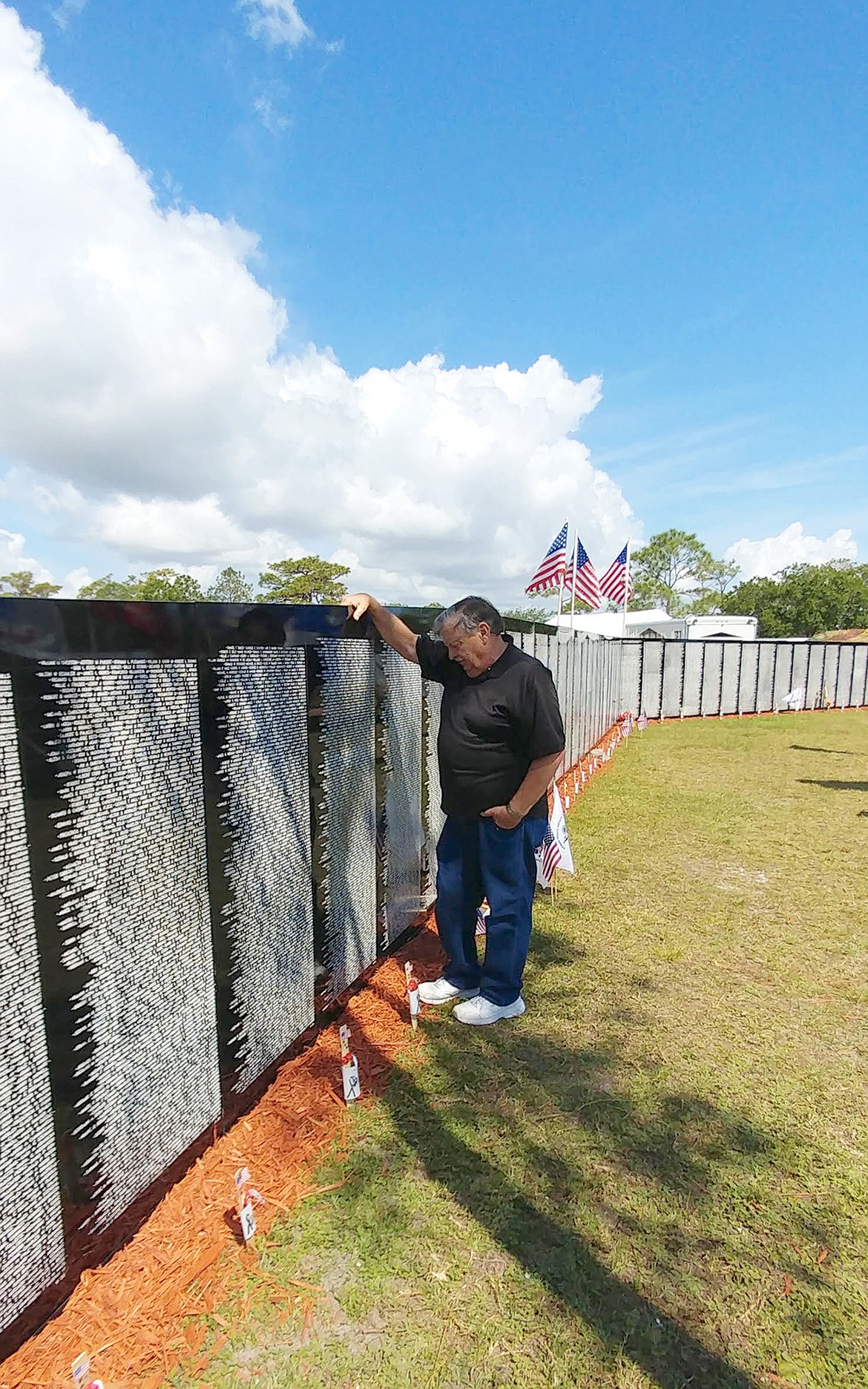 Stan Bain visits the Vietnam Traveling Memorial Wall in Melbourne, Florida, in May 2017.