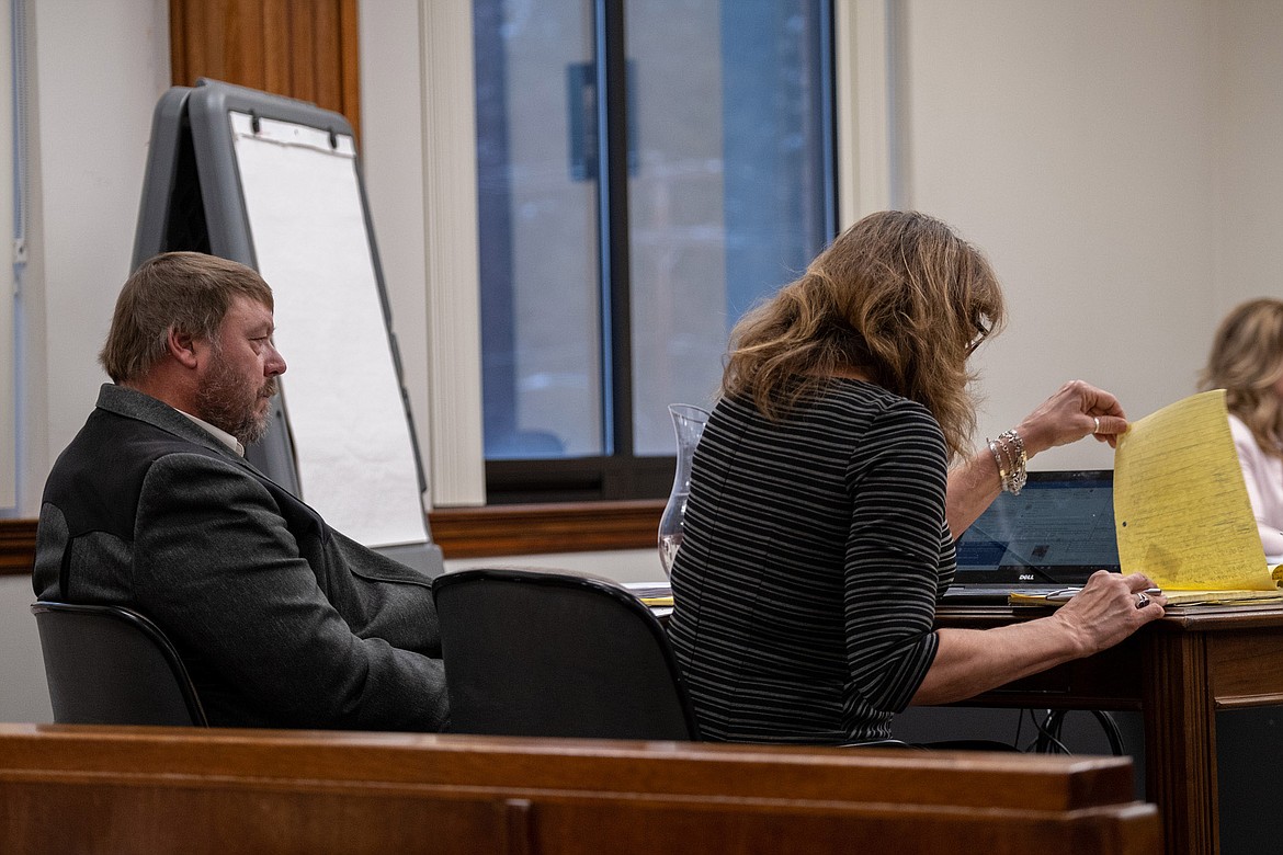 Lincoln County Sheriff Roby Bowe, left, and Maureen Lennon, his attorney from the Montana Association of Counties, attend a hearing in Montana 19th Judicial District Court Friday, Nov. 9, 2018. (John Blodgett/The Western News)