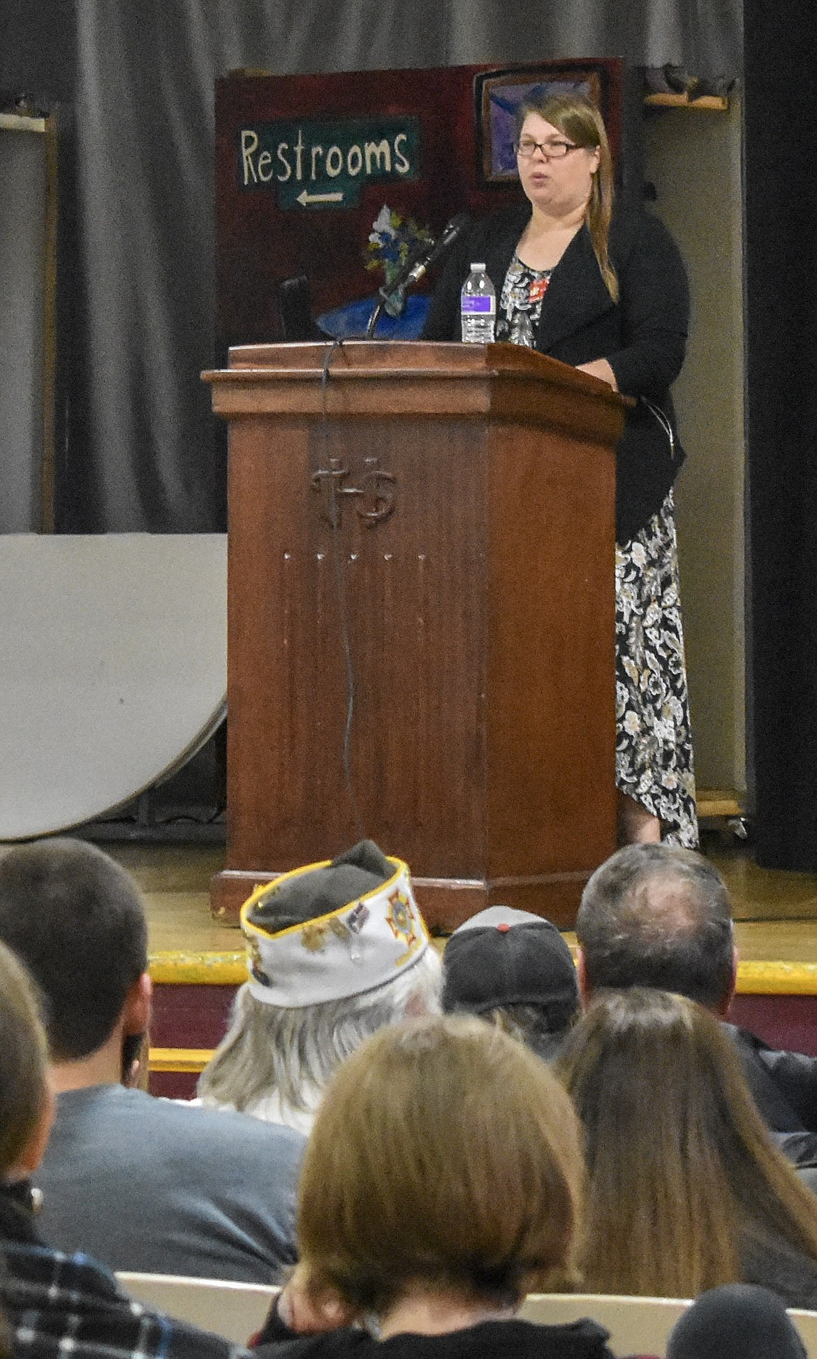 Montana State VFW Jr. Vice Commander Rose Arnold speaks to the Troy Middle-High School and U.S. military veteran guests. Arnold spoke about her service with the U.S. Army in Iraq and challenges she faced as a female soldier. She encouraged the students to stand up for what is right regardless the personal sacrifice, and to demonstrate gratitude for the sacrifices of servicemembers by the way they work, serve others and live their own lives. (Ben Kibbey/The Western News)