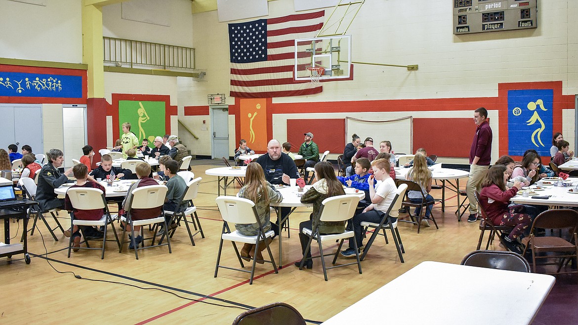 Veterans, family and students gathered for a Veterans Day breakfast at W.F. Morrison Elementary Monday. (Ben Kibbey/The Western News)