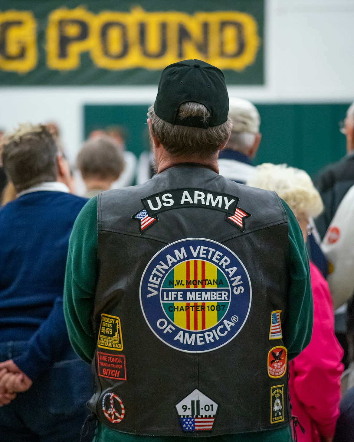 A veteran stands proudly during a Veterans Day assembly last Friday. (Daniel McKay photos/Whitefish Pilot)