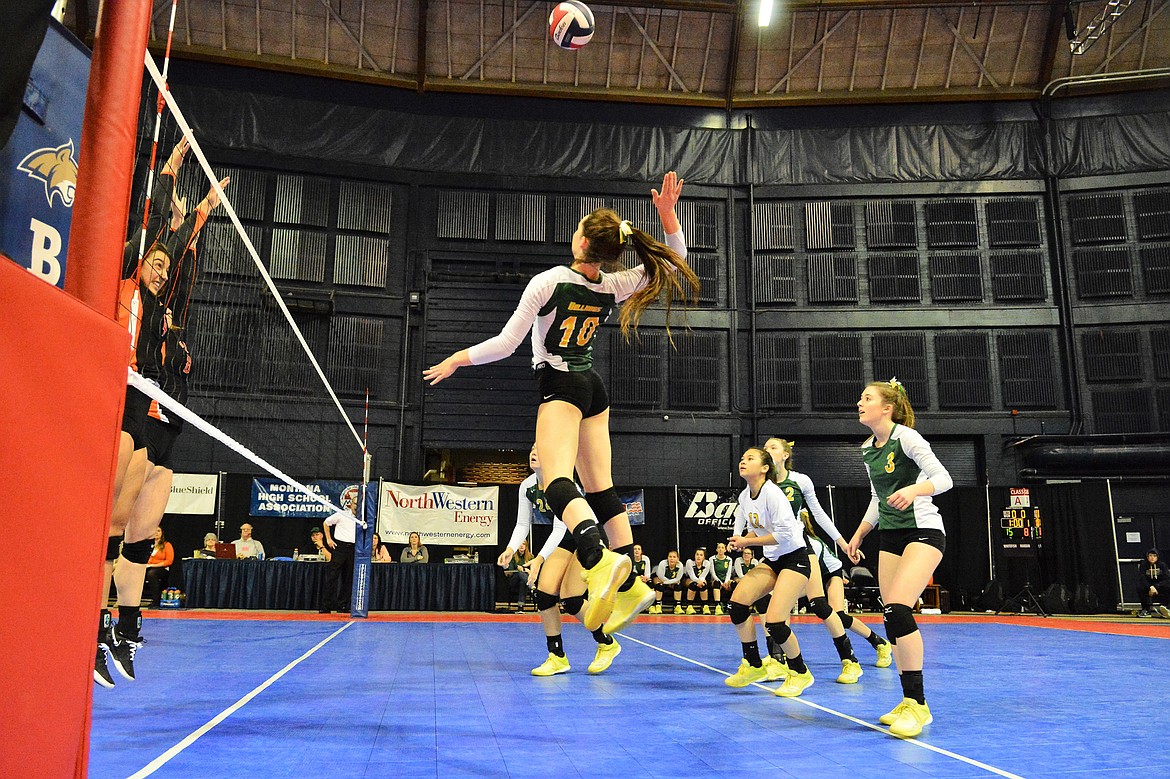 Kaiah Moore rises for the kill against Hardin in the Class A State Tournament last week in Bozeman. (Jeff Doorn photos)