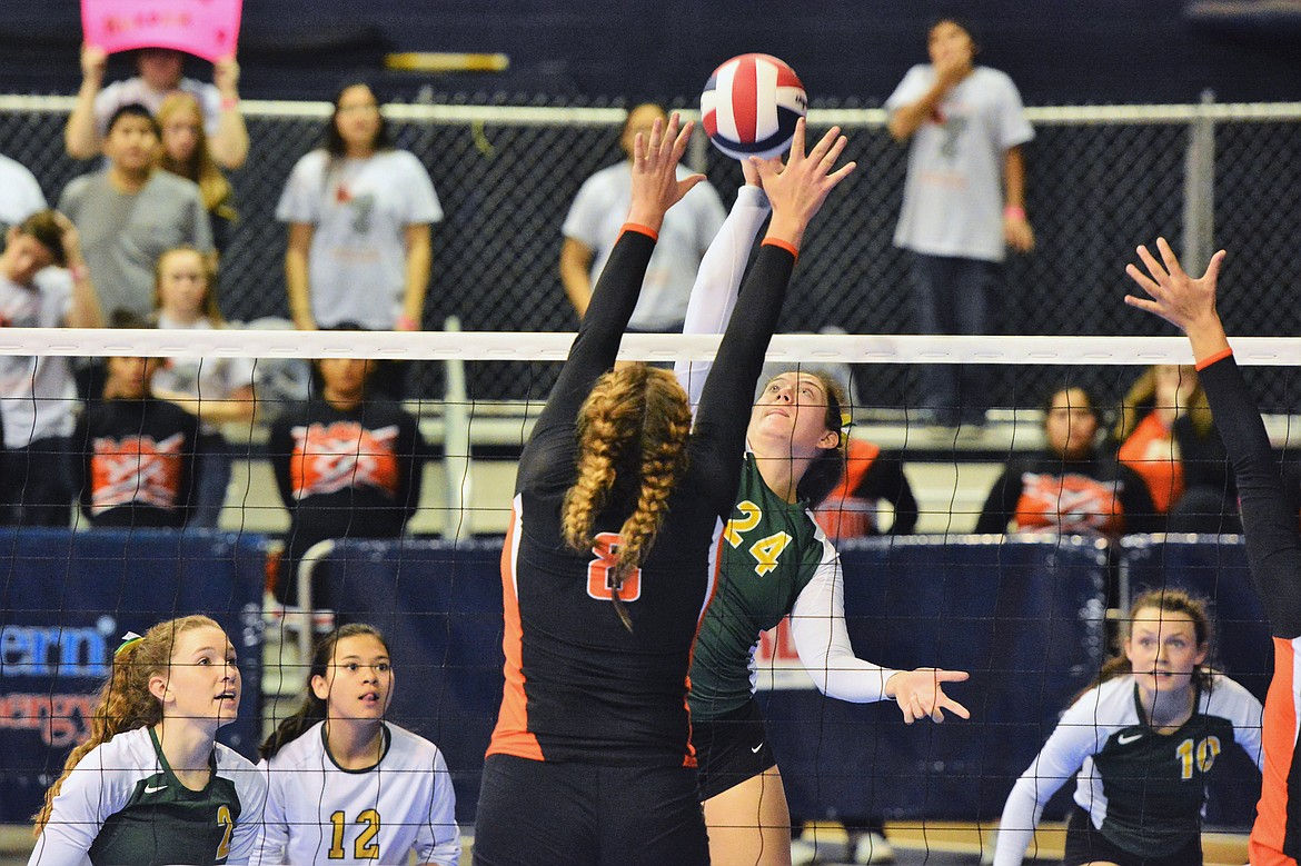 Marlee Bender spikes the ball against Hardin in the Class A State Tournament last week in Bozeman.