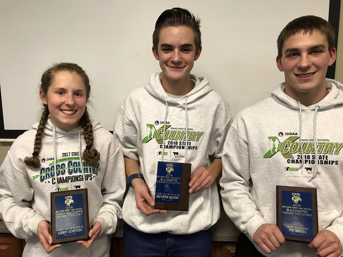 Abby Gorton, Hunter Smith and Ty Grigg showing off their awards.