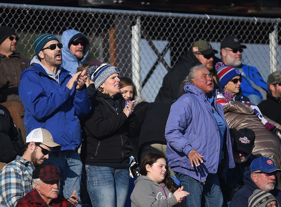 The crowd cheers on the Cats.