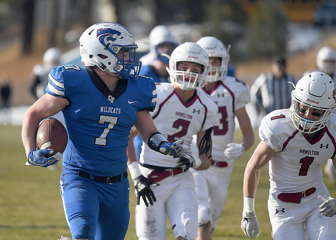 Colten McPhee runs for his first touchdown in the first half. (Chris Peterson photo)