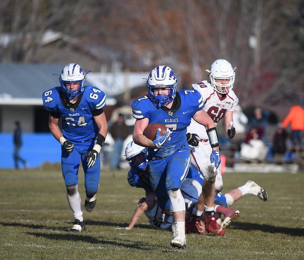 Colten McPhee busts through the line en route to a second half touchdown.