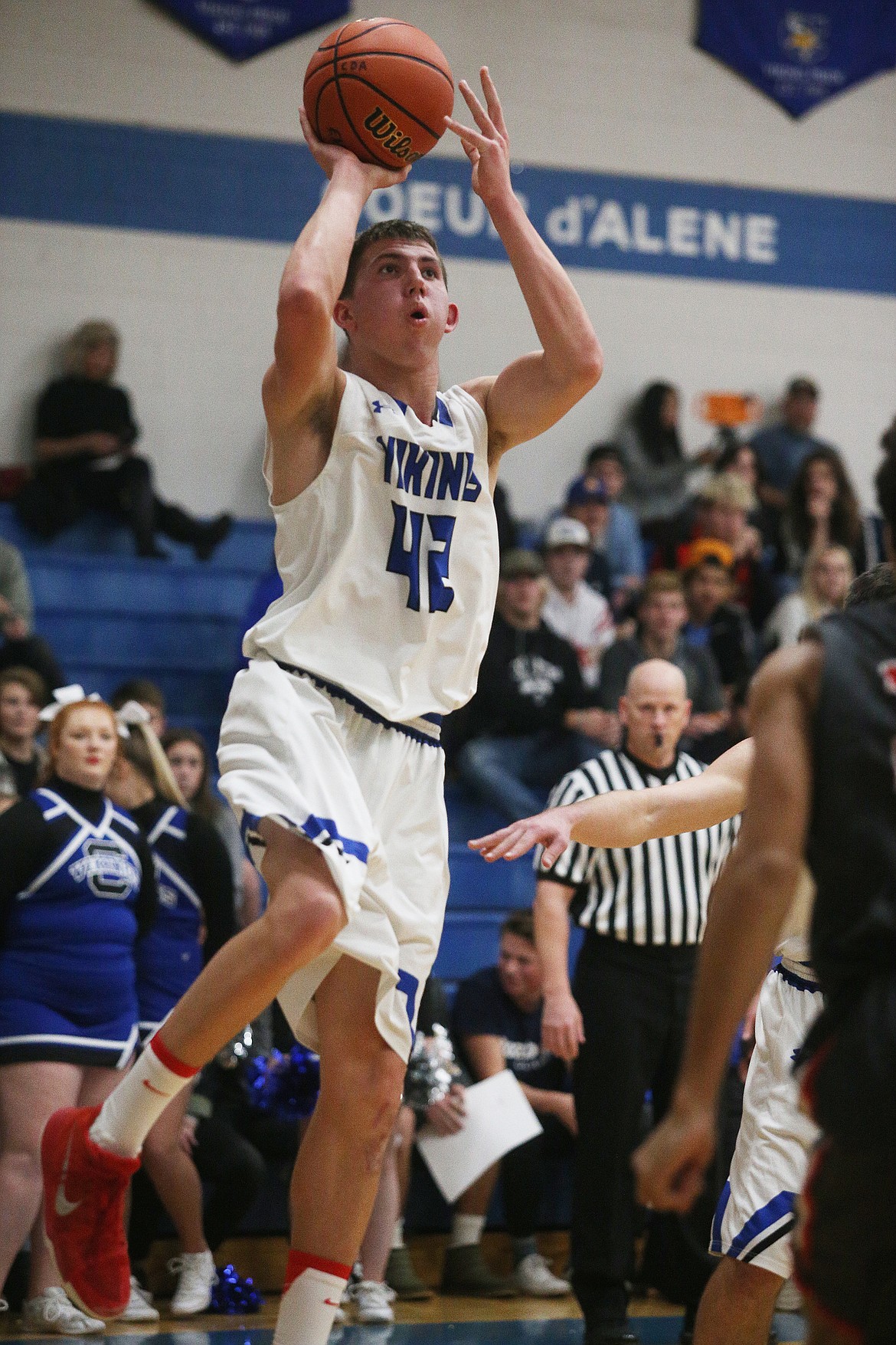 Coeur d&#146;Alene&#146;s Kale Edwards shoots for the basket against Ferris in Tuesday night&#146;s game at Viking Court. (LOREN BENOIT/Press)