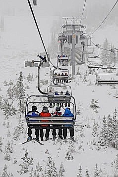 Photo courtesy of Schweitzer Mountain Resort
Skiers ride a lift at Schweitzer Mountain Resort near Sandpoint during the opening weekend.