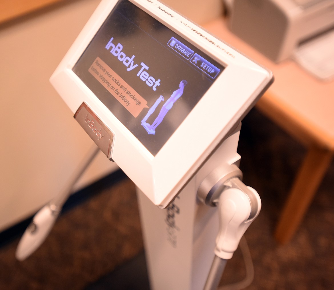 Dr. Bayne French demonstrates the InBody Test at Glacier Medical Associates in Whitefish, on Monday, November 26.(Brenda Ahearn/Daily Inter Lake)