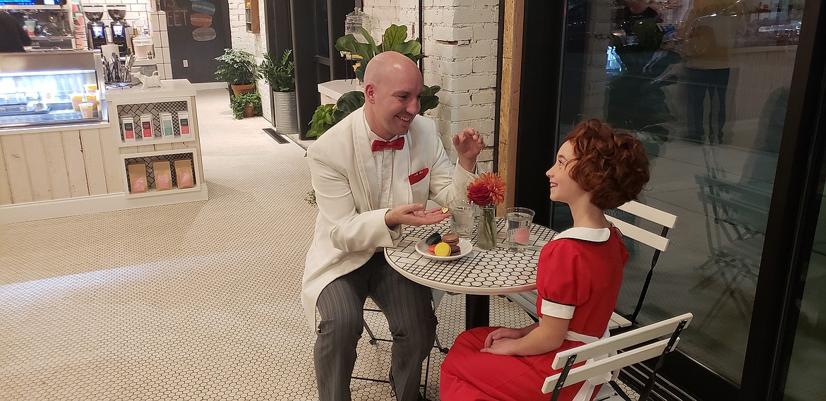 Spencer Normington, as Daddy Warbucks and Ruby Krejec, as Annie.