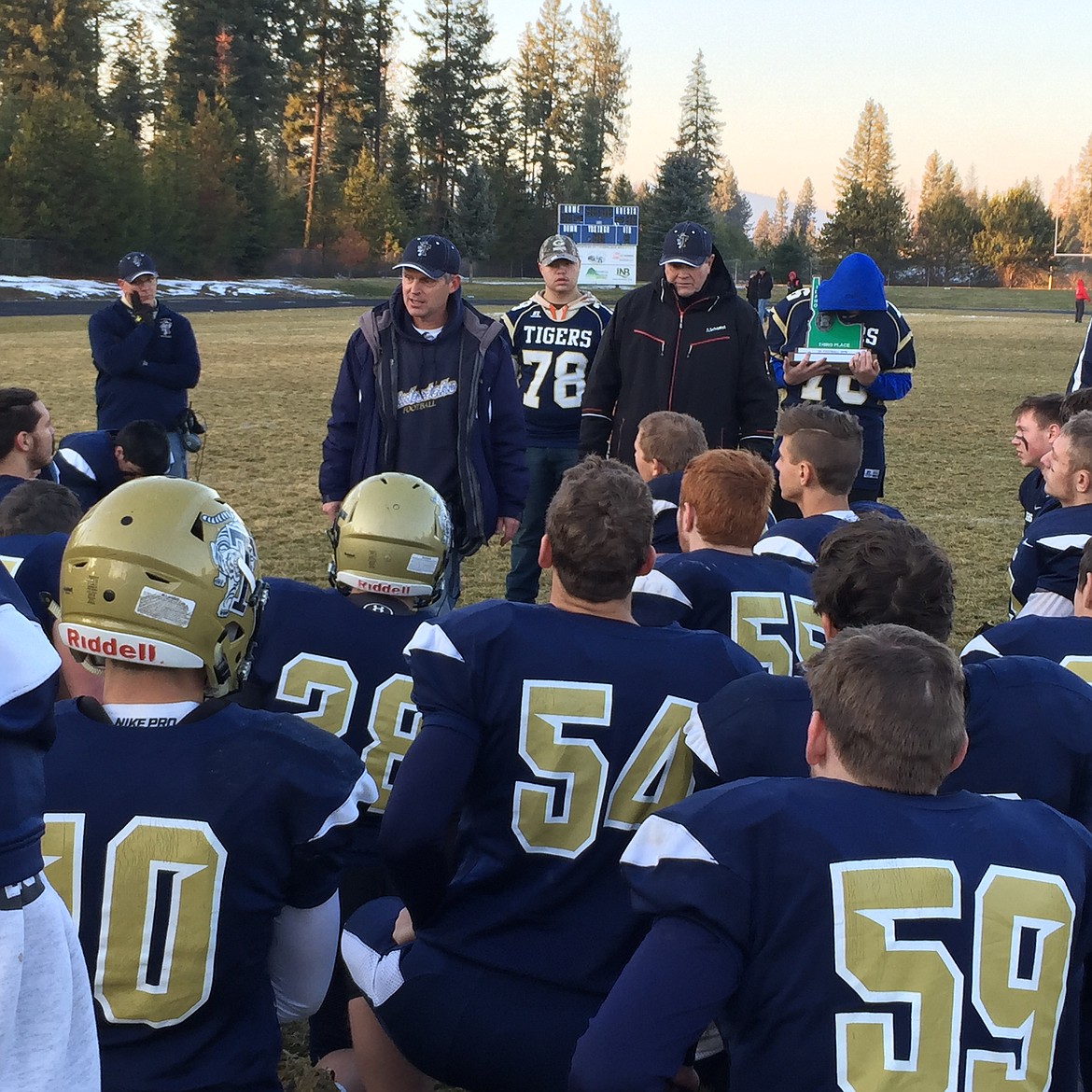 MARK NELKE/Press file
While Roy Alberston was away from his team last year following heart bypass surgery, offensive coordinator Brian Kluss, left, added the role of interim head coach.