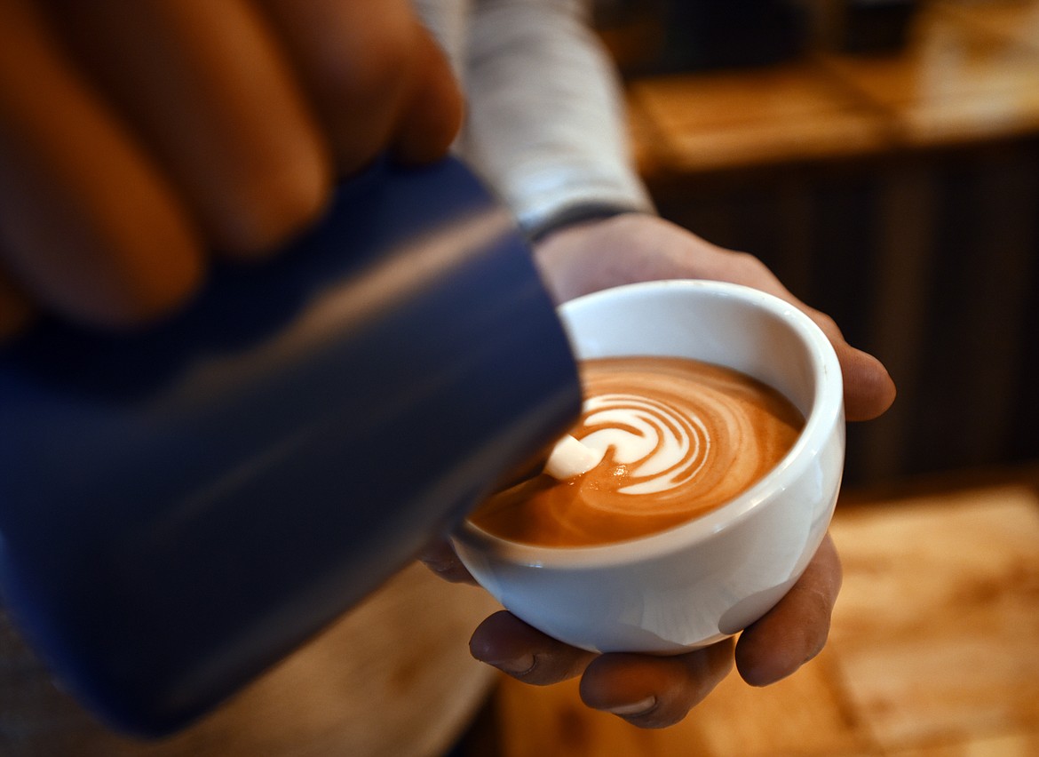 The beginning of a latte leaf-pattern at the the Dobson Creek Coffee Company on Tuesday, November 13, in Ronan.(Brenda Ahearn/Daily Inter Lake)