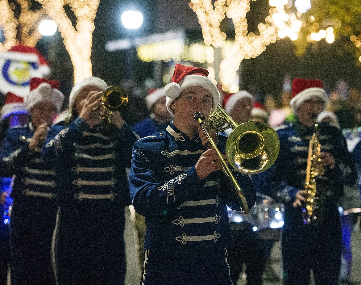 Thomas Isaksen, with the Coeur d'Alene Viking Band, plays a tune while performing in last year's Lighting Ceremony Parade. (LOREN BENOIT/Press File)