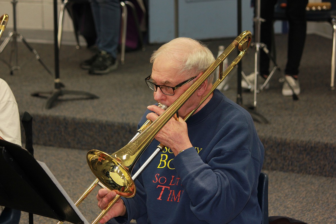 Trombonist Bob Saboe is one of the charter members of the Bonners Ferry Community Orchestra, which also includes 12-year-old Jonas Snyder (below).