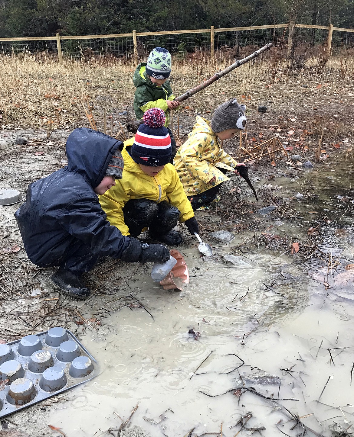 Preschool students make new creations at the pond area known as the &#147;Foxtail Baker.&#148; (Hilary Matheson/Daily Inter Lake)