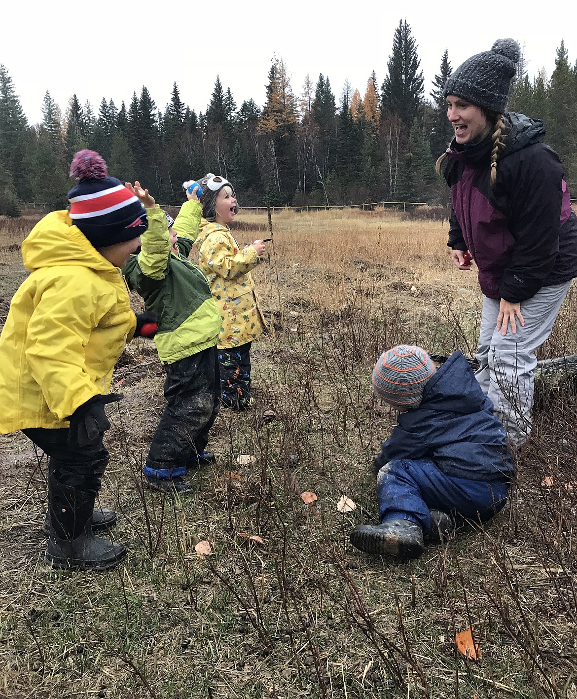 Foxtail Forskola founder and teacher Kayla Nickells leads preschoolers in song. (Hilary Matheson/Daily Inter Lake)