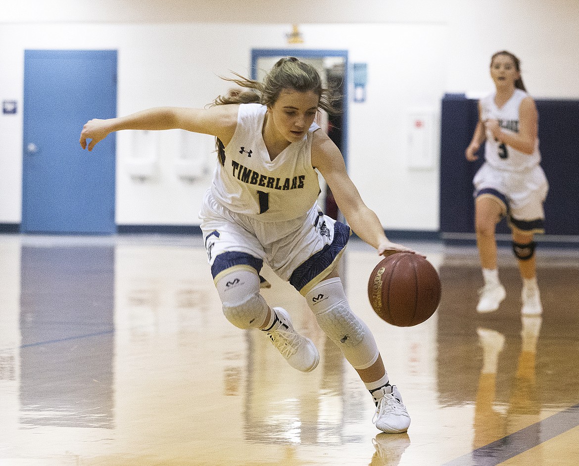 LOREN BENOIT/Press
Timberlake&#146;s Taryn Soumas dribbles the ball near the edge of the court in a game against Lewiston on Tuesday night at Timberlake High School.