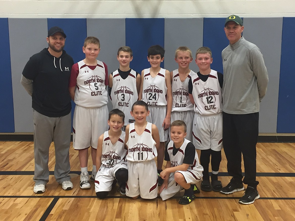 Courtesy photo
The North Idaho Elite fourth-grade boys basketball team went 5-0 and won the 4th/5th grade River City Tournament recently in Post Falls. In the front row from left is Ben Mcelvany, Brett Johnson and Maddox Lindquist; and back row from left, coach Mike Lindquist, Jordan Carlson, Britton Johnston, Wyatt Carr, Tanner Stern, Jackson Hackett and coach Royce Johnston.