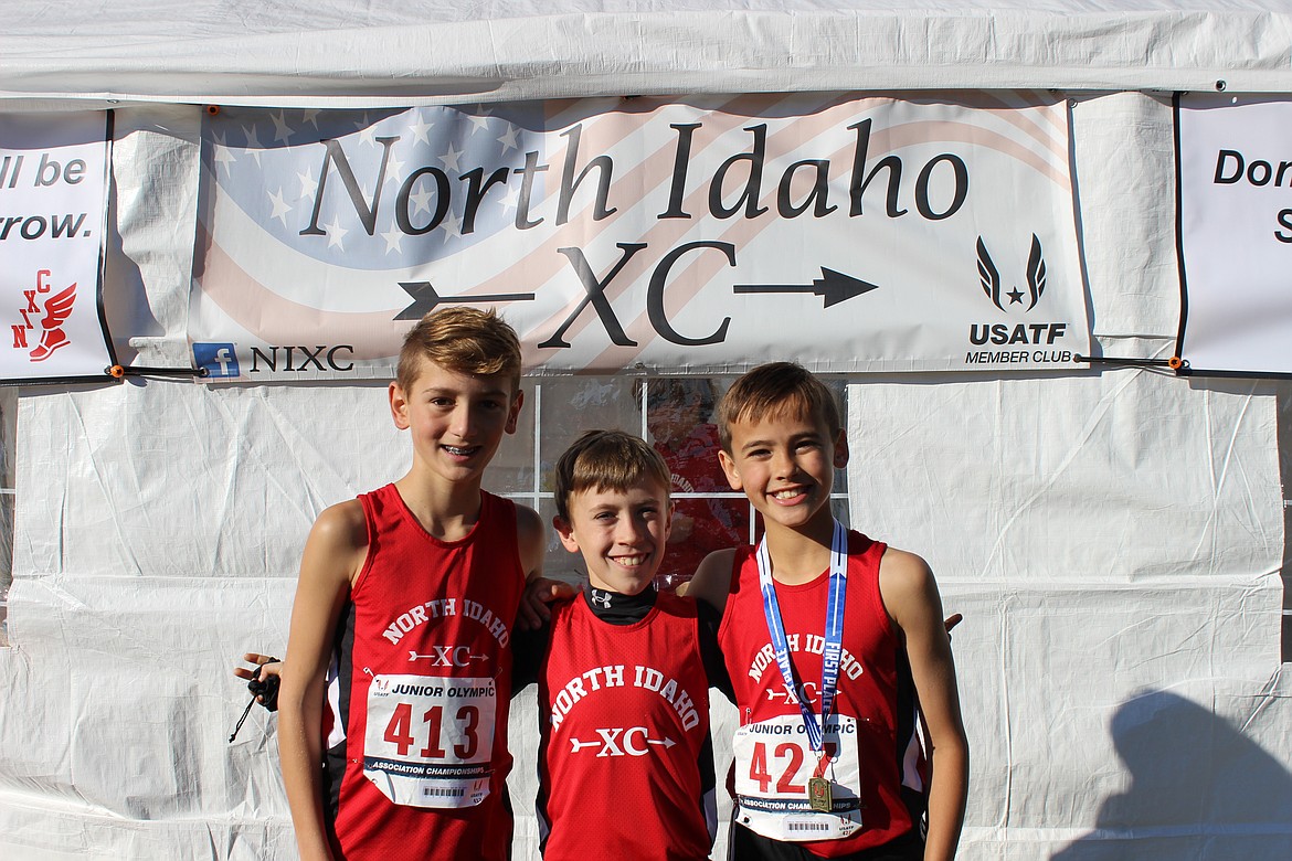 Courtesy photo
From left, Max Cervi-Skinner, Rowan Henry and Mitchell Rietze of North Idaho Cross Country each took first place in their age group at the USA Track and Field Region 13 Junior Olympic Championship on Saturday in Yakima, Wash.