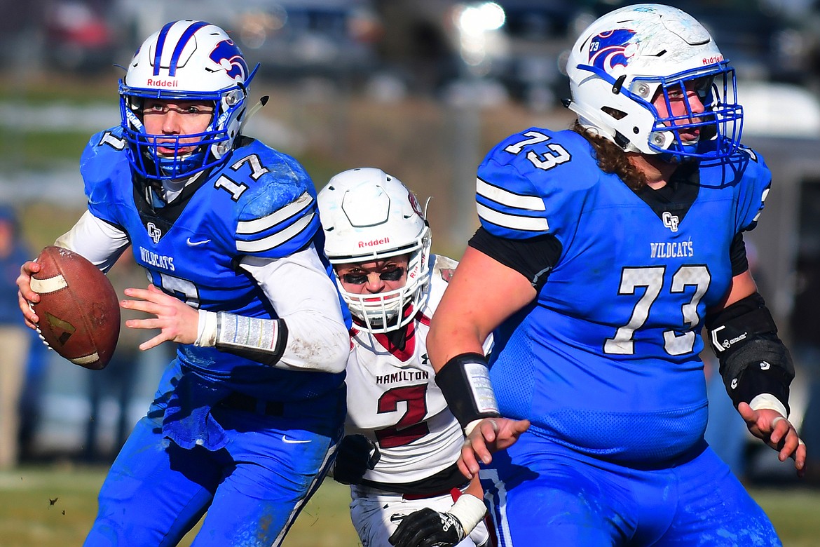 Wildcat quarterback Drew Morgan, left, was recently named to the Class A All-State football team, as was guard Gage Karlin, right. (Jeremy Weber photo)