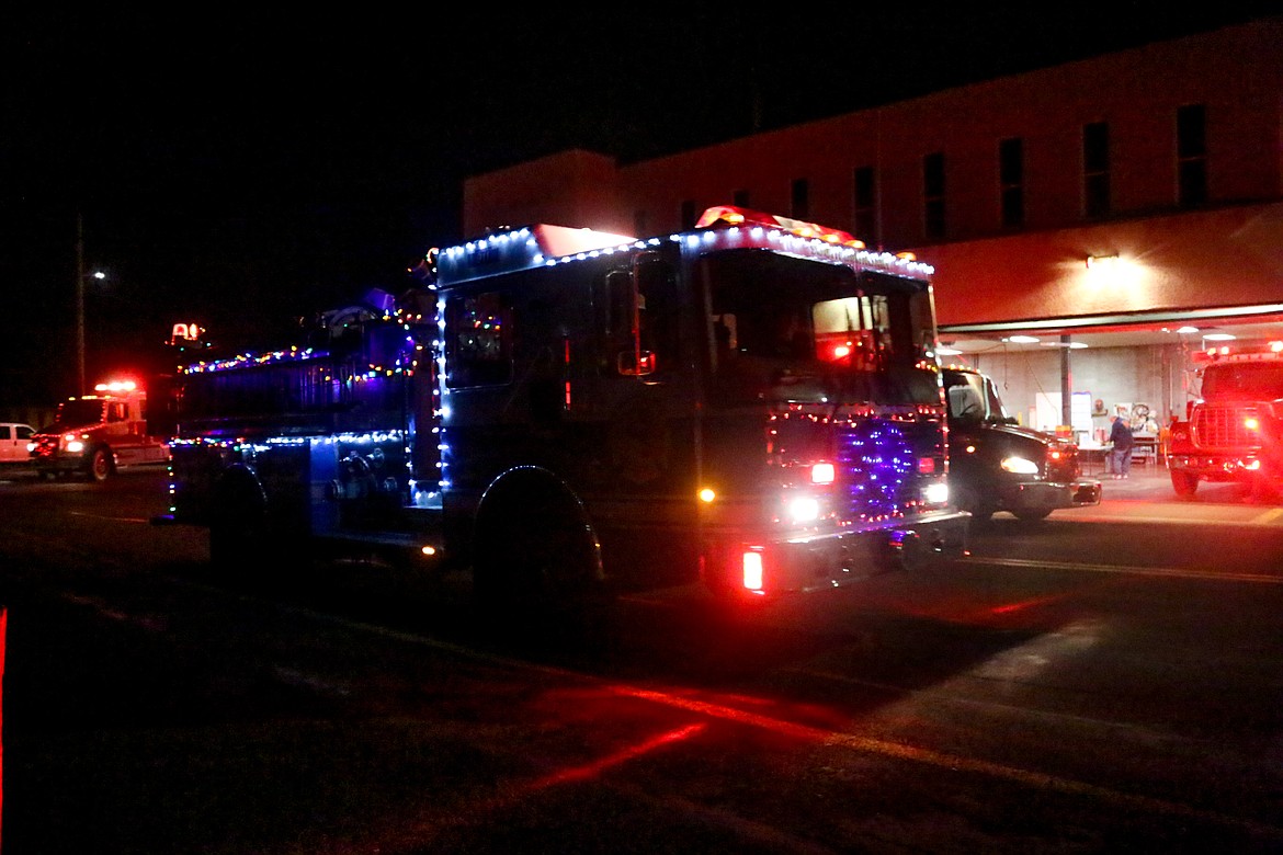 The firetrucks are decorated for the event.