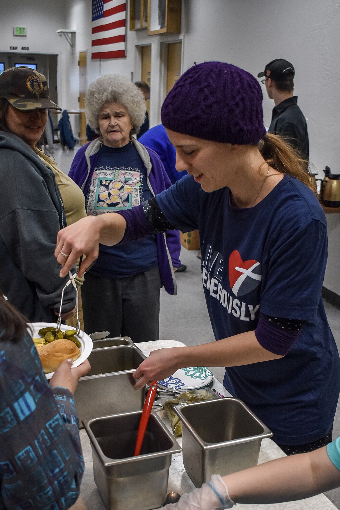 Sonia Miller serves diners during the annual Thanksgiving Day dinner put on the by Libby Ministerial Association, which was hosted at VFW Post 1548 this year. (Ben Kibbey/The Western News)