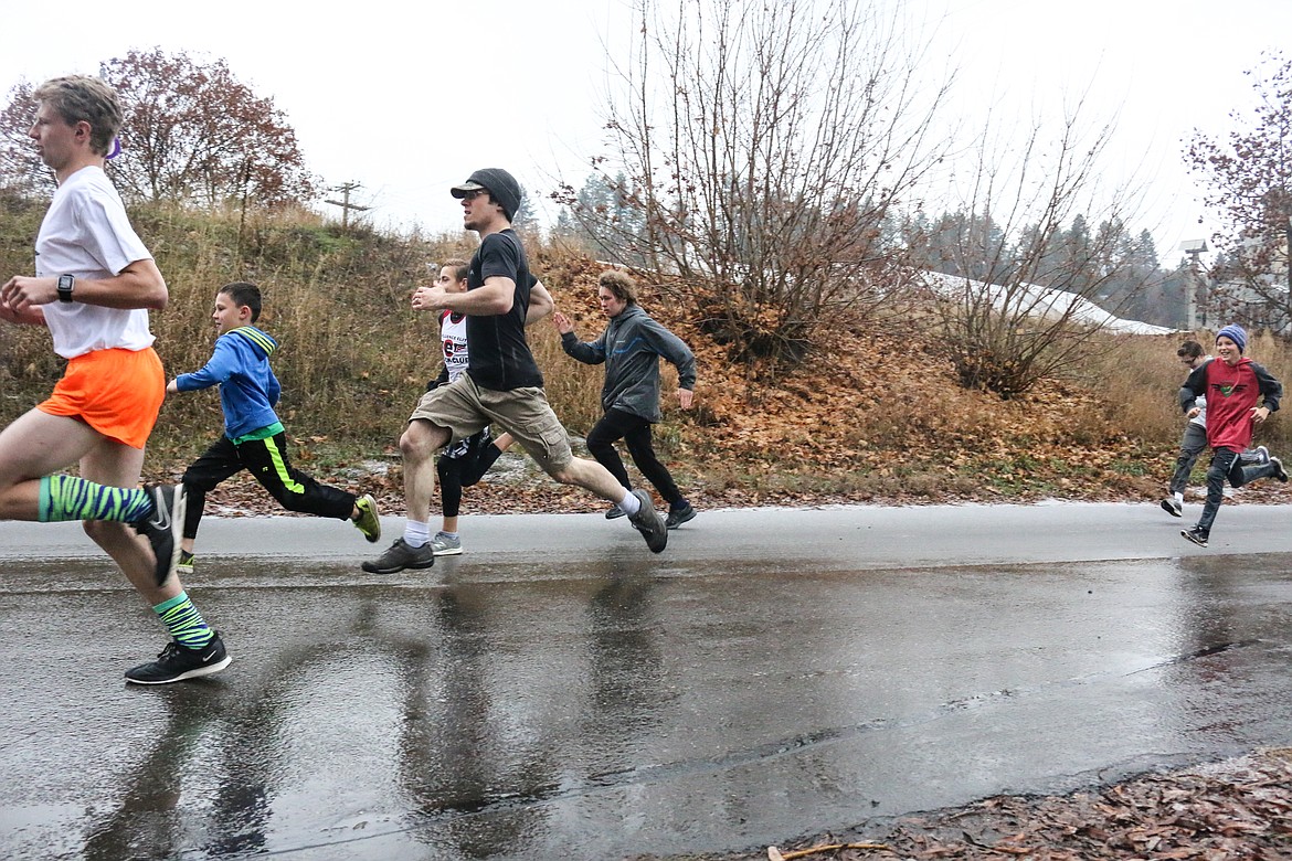 Photo by MANDI BATEMAN
The runners brought enthusiasm as they rocketed off the start line during the Turkey Trot fun run.