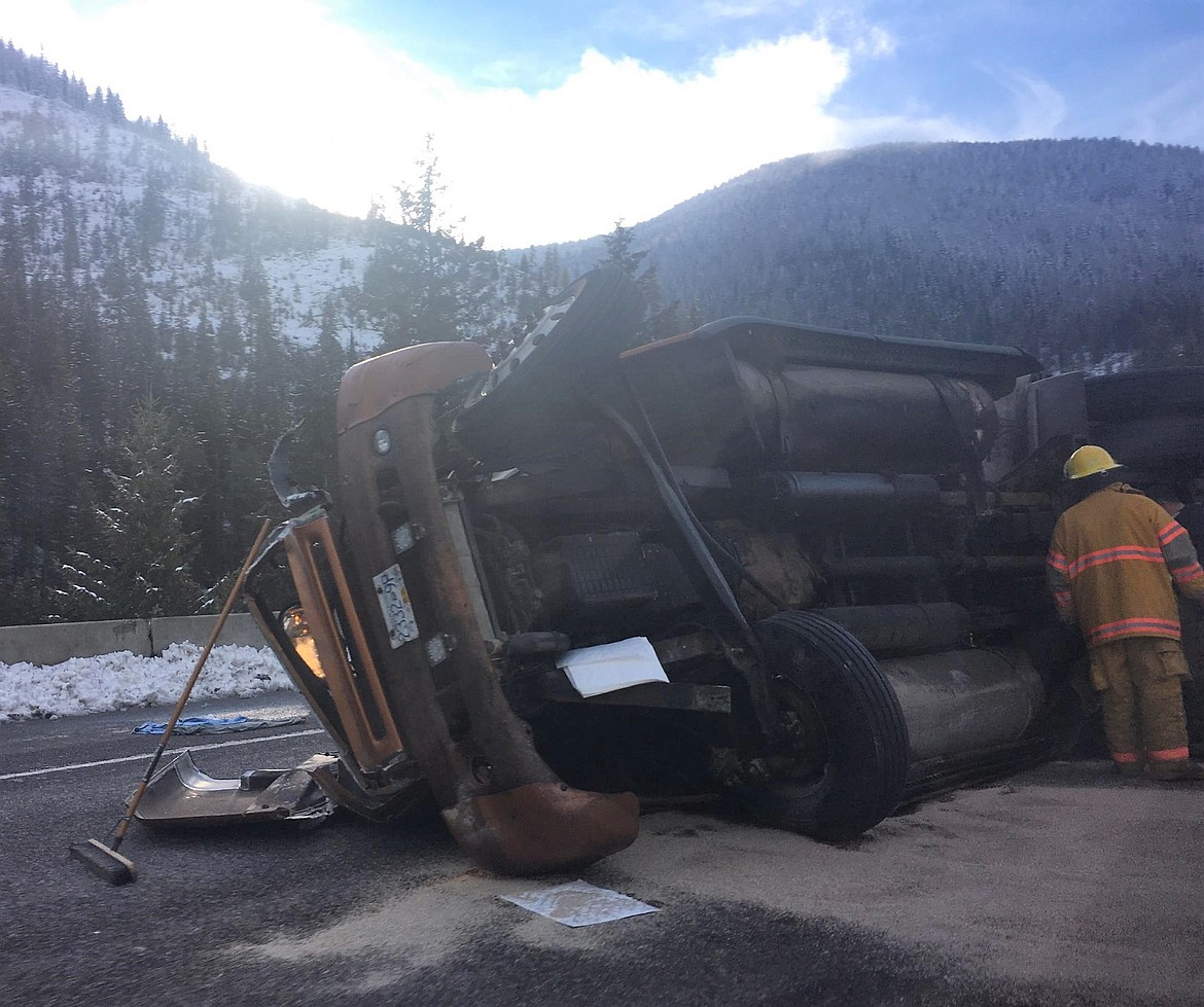 A semi-truck and trailer from British Columbia crashed near mile marker 12 in the eastbound lane of Interstate 90 on Sunday, Nov. 25 around 1 p.m. No other vehicles were involved, and the driver was taken to the hospital with some injuries. (Photo by Chris Kelly)