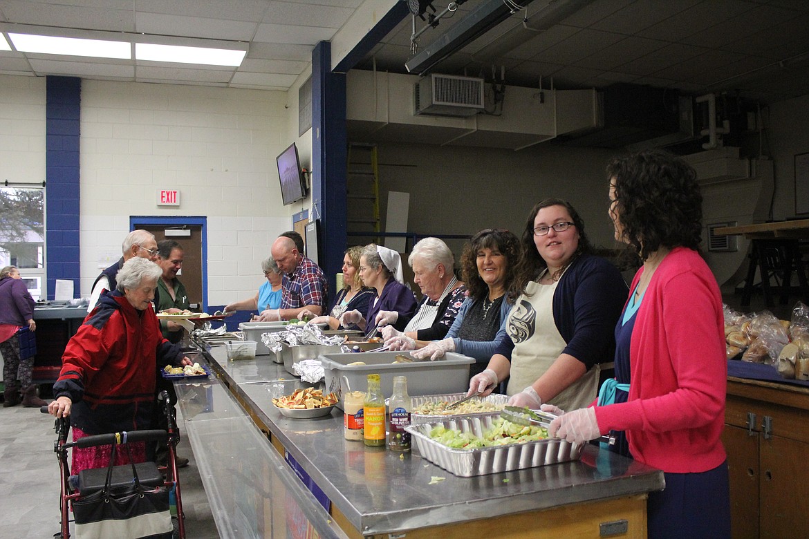 Photo By TANNA YEOUMANS
With a variety of food choices, attendees were able to pick what they liked best for their Thanksgiving meal.