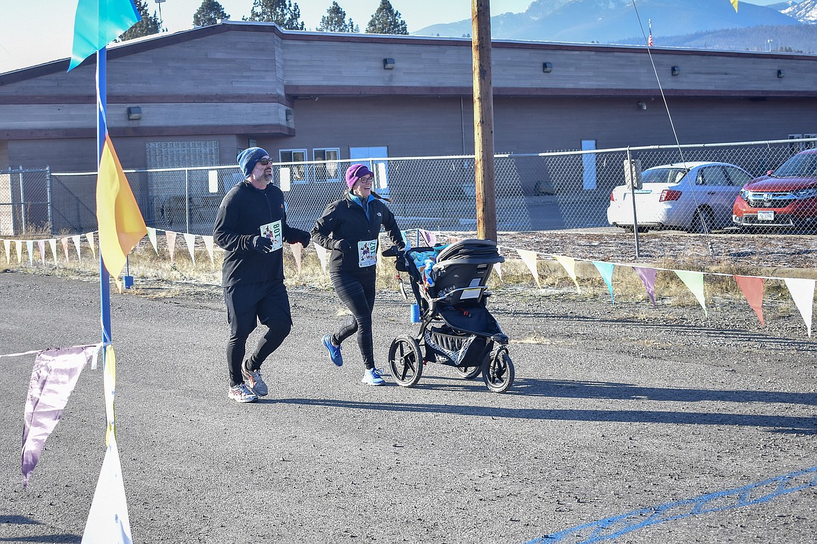 Teagan and Callie Blaz are all smiles finishing the Turkey Dash 5k fun run/walk Saturday, Nov 17. (Ben Kibbey/The Western News)