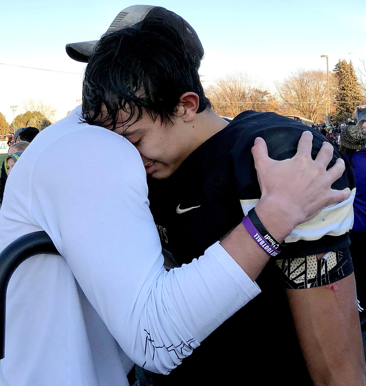 Rodney Harwood/Sun Tribune - Former Royal standout Kaden Jenks consoles Knights senior Angel Farias after Saturday's semifinal loss to Colville.