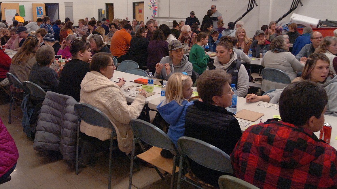 The multi-purpose room at Hot Springs School was filled to capacity during the Hot Springs Lions Club&#146;s OGNIB fundraiser Sunday. Club member Lawrence Walchuk said he counted 140 people playing OGNIB, a new wrinkle on BINGO. It was a &#147;big turnout,&#148; Walchuk said.